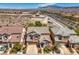 Aerial shot of the property showcases its location, proximity to amenities, and neighborhood layout in a residential area at 10116 Nash Peak Ave, Las Vegas, NV 89166