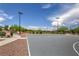 Outdoor basketball court with well-maintained court and landscaping creates a great place to play at 10116 Nash Peak Ave, Las Vegas, NV 89166