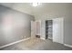 Well-lit bedroom with a closet and a view of an adjacent room at 10116 Nash Peak Ave, Las Vegas, NV 89166