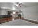 Open-concept kitchen features a large island, stainless steel appliances, and dark wood cabinetry at 10116 Nash Peak Ave, Las Vegas, NV 89166