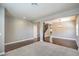 Spacious living area with hardwood floors, carpet, and an elegant light fixture at 10116 Nash Peak Ave, Las Vegas, NV 89166