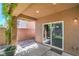 Covered patio featuring climbing vines and an outdoor entrance, offering a shaded outdoor space at 10116 Nash Peak Ave, Las Vegas, NV 89166