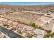 Nice street view of homes in this community with tile roofs and desert landscaping at 10116 Nash Peak Ave, Las Vegas, NV 89166