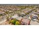 A view of the neighborhood highlighting mature trees lining the streets and well-kept properties at 10116 Nash Peak Ave, Las Vegas, NV 89166