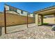 Spacious backyard with hardscape, turf, and privacy wall at 10271 Bark Pine Ct, Las Vegas, NV 89166