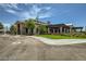 Community clubhouse featuring a covered patio and well-manicured landscaping at 10271 Bark Pine Ct, Las Vegas, NV 89166
