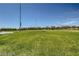 Expansive community field providing ample space for outdoor activities at 10271 Bark Pine Ct, Las Vegas, NV 89166