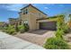 Charming two-story home with a two car garage and paved driveway at 10271 Bark Pine Ct, Las Vegas, NV 89166