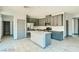 Modern kitchen with stainless steel appliances and quartz countertops at 10271 Bark Pine Ct, Las Vegas, NV 89166