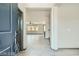 Bright, open-concept living space with tile flooring at 10271 Bark Pine Ct, Las Vegas, NV 89166