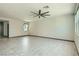 Spacious living room with recessed lighting, fan and tile flooring at 10271 Bark Pine Ct, Las Vegas, NV 89166
