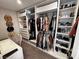 Well-organized walk-in closet with ample shelving, rods, and desk at 10383 Andele Ave, Las Vegas, NV 89166