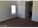 Bedroom featuring a window, neutral walls, and carpeted floors, complemented by a clean, minimalist design at 1083 Sterling Peak St, Las Vegas, NV 89110