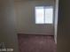 Bedroom features carpet flooring and a bright window at 1083 Sterling Peak St, Las Vegas, NV 89110