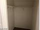 A compact closet featuring built-in shelving and a neutral color palette, perfect for organized storage at 1083 Sterling Peak St, Las Vegas, NV 89110