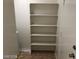 Functional laundry area with shelving for optimal storage solutions at 1083 Sterling Peak St, Las Vegas, NV 89110