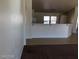 View from the living area into the kitchen and dining area at 1083 Sterling Peak St, Las Vegas, NV 89110
