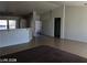Open-concept living space with a breakfast bar and tile flooring at 1083 Sterling Peak St, Las Vegas, NV 89110