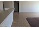 Spacious living room with tile flooring, offering a neutral backdrop perfect for customization and comfortable living at 1083 Sterling Peak St, Las Vegas, NV 89110