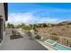 Relaxing balcony with seating, rug, and an adjacent plunge pool showcasing mountain views at 11 Morninglow Pass, Henderson, NV 89052