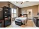 Bedroom with modern furnishings and view of outside at 11 Morninglow Pass, Henderson, NV 89052