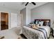 Bedroom featuring neutral colors, ceiling fan, and adjacent rooms at 11 Morninglow Pass, Henderson, NV 89052