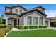 Stylish home with a well-kept lawn, neat landscaping, and a welcoming entrance at 11 Morninglow Pass, Henderson, NV 89052