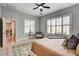 Cozy main bedroom features large windows with shutters at 11 Morninglow Pass, Henderson, NV 89052