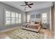 Cozy main bedroom with large windows and a decorative rug at 11 Morninglow Pass, Henderson, NV 89052