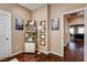 Bright office showcases hardwood floors, shelving, and access to the hallway at 11 Morninglow Pass, Henderson, NV 89052