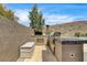 Outdoor kitchen featuring a built-in grill, countertop space, and storage at 11 Morninglow Pass, Henderson, NV 89052
