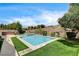 Beautiful pool and spa with ample deck space, complemented by mature landscaping and desert views at 11 Morninglow Pass, Henderson, NV 89052