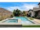 Relaxing pool and spa with lush landscaping and a serene outdoor setting at 11 Morninglow Pass, Henderson, NV 89052