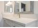 Close up of bright bathroom with white quartz countertop and new faucet at 111 Pomelo Ct, Henderson, NV 89074