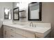 Elegant bathroom with double sinks, framed mirrors, and ample counter space, a spa-like retreat at 111 Pomelo Ct, Henderson, NV 89074