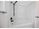 Clean, white bathtub and shower combination with black fixtures at 111 Pomelo Ct, Henderson, NV 89074
