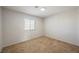 Neutral bedroom with carpet and a window letting in natural light at 111 Pomelo Ct, Henderson, NV 89074