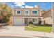 Charming two-story home with a well-maintained yard and attached garage, perfect for suburban living at 111 Pomelo Ct, Henderson, NV 89074