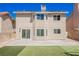 Home exterior featuring a neutral stucco finish, sliding glass doors, and a concrete patio at 111 Pomelo Ct, Henderson, NV 89074