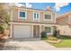 Charming two-story home with a well-maintained yard and attached garage, perfect for suburban living at 111 Pomelo Ct, Henderson, NV 89074