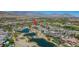 The community with a golf course, several ponds, and mountain views at 11359 Winter Cottage Pl, Las Vegas, NV 89135