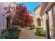Beautiful courtyard with water feature and mature trees at 11359 Winter Cottage Pl, Las Vegas, NV 89135