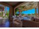 Inviting covered patio with stylish furniture, perfect for entertaining at 11359 Winter Cottage Pl, Las Vegas, NV 89135