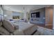 This main bedroom features a fireplace, TV and a beautiful view at 11359 Winter Cottage Pl, Las Vegas, NV 89135