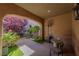 Covered patio with courtyard view, perfect for outdoor relaxation at 11359 Winter Cottage Pl, Las Vegas, NV 89135