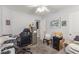 Bedroom featuring gray walls, natural light, plush carpet and a modern black desk chair at 11739 Village Arbor St, Las Vegas, NV 89183