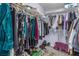 Walk in closet with shelving for organization on three sides. Storage for clothes, shoes and accessories at 11739 Village Arbor St, Las Vegas, NV 89183