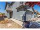 Two-story home features a well-maintained front yard and a convenient two-car garage at 11739 Village Arbor St, Las Vegas, NV 89183
