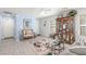 Bright living room with tile floors, ceiling fan, and stylish decor at 11739 Village Arbor St, Las Vegas, NV 89183