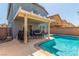 Relaxing backyard pool and patio area with shade structure at 11739 Village Arbor St, Las Vegas, NV 89183